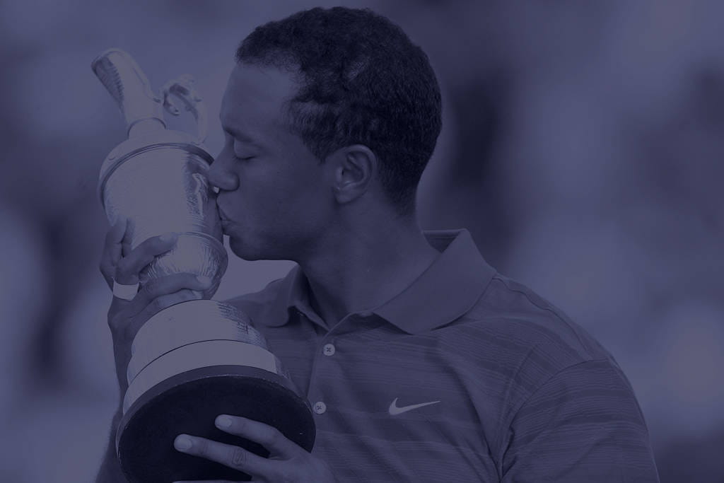 Tiger Woods kisses the Claret Jug in 2006